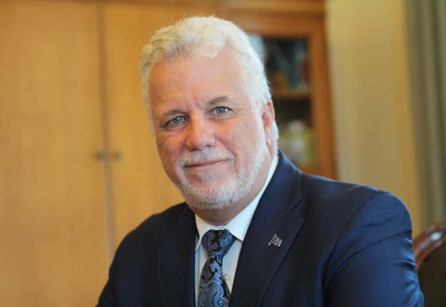 Philippe Couillard dans son bureau de l’édifice Honoré-Mercier, à Québec, le 14 août dernier. Crédit photo : Thierry Larivière/TCN